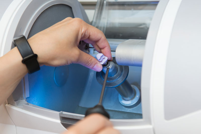 Dental bridge machine.