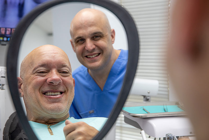 implants or dentures